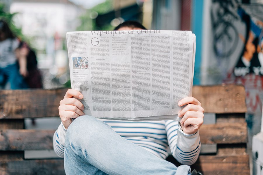 Reading a printed newspaper